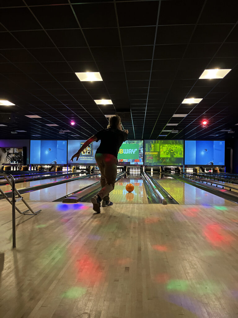 Bowling at Pinheads Bowling in New River Gorge during cosmic bowling is one of the many rainy day activities in New River Gorge